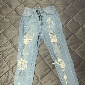 FASHION NOVA RIPPED JEANS